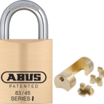 Key-in-Knob Brass Padlock 1-3/4in Wide - Includes Adaptors for OEM Cylinders, Shackle - 5/16in Diameter and 1in Vertical Clearance, Boxed